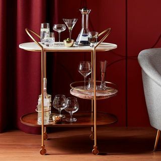 جون لويس وشركاه + عربة Swoon Raine Bar Cart الذهبية